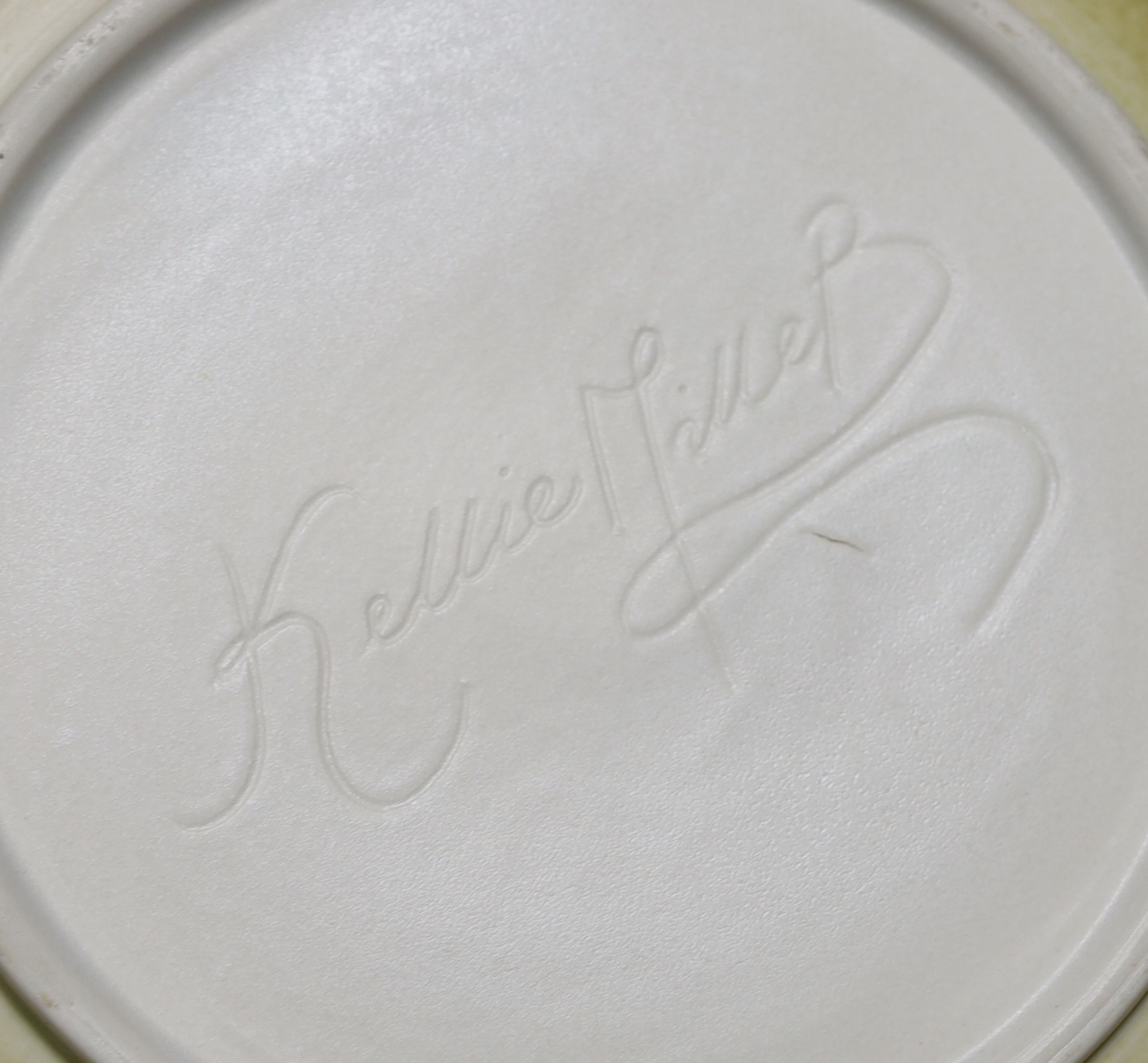 A large Kellie Miller porcelain bowl, signed to base, 25cm diameter